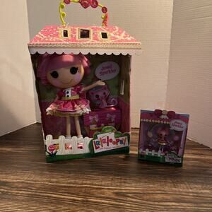 Lalaloopsy Jewel Sparkles dolls, a large version and a smaller "Minis" Read